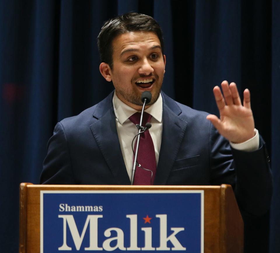 Shammas Malik thanks his supporters as he gives his victory speech at his mayoral watch party in the atrium of the John S. Knight Center in Akron on Tuesday.