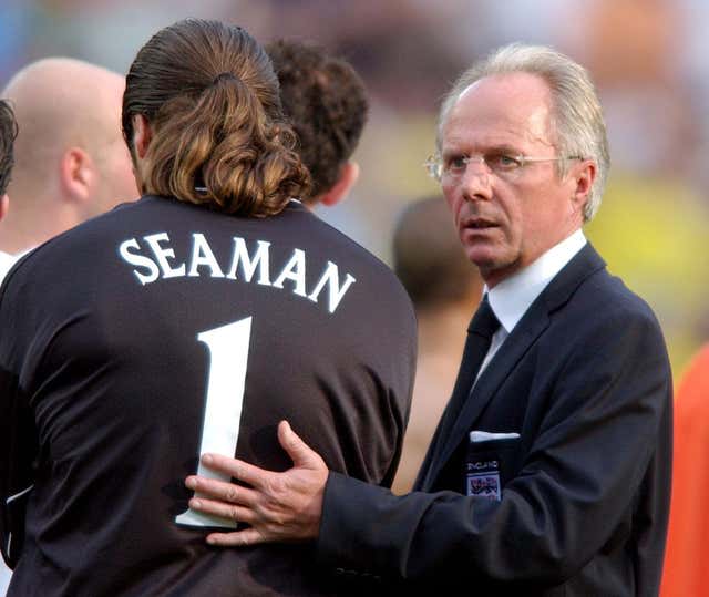 England goalkeeper David Seaman is consoled by Eriksson after the defeat against Brazil