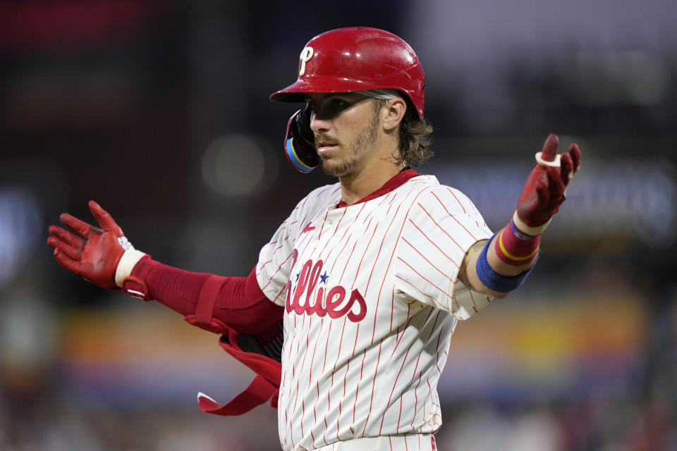 Philadelphia Phillies' Bryson Stott reacts after hitting a run-scoring single against Los Angeles Dodgers pitcher Anthony Banda during the fifth inning of a baseball game, Wednesday, July 10, 2024, in Philadelphia. (AP Photo/Matt Slocum)