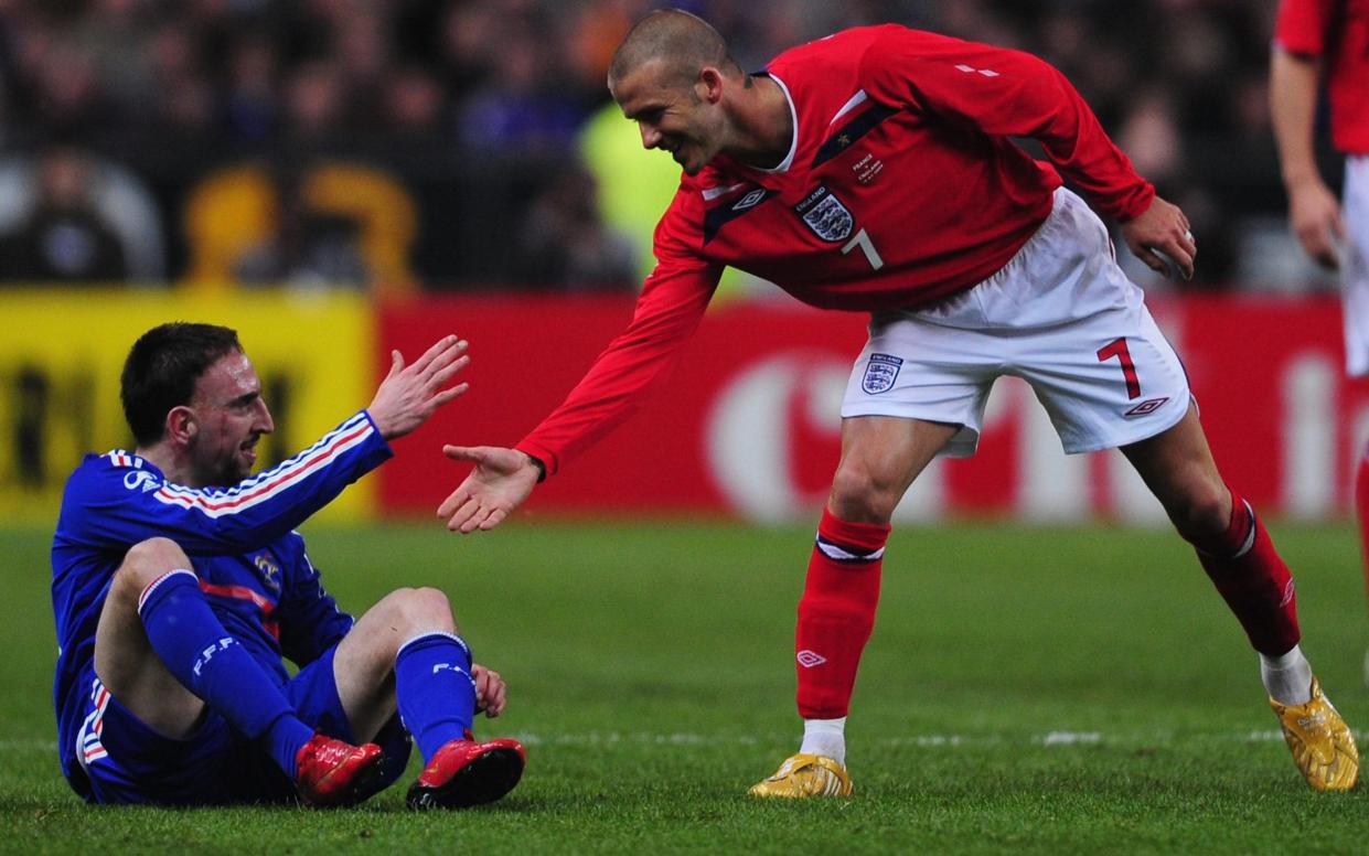 David Beckham wore commemorative gold boots with a St George's Cross embroidered on the back for his 100th cap — a 1-0 friendly defeat to France