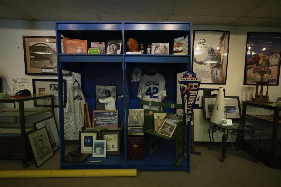 A display shows memorabilia, Monday, June 10, 2024, from a film called "42" that was filmed at Rickwood Field, in Birmingham, Ala. Rickwood Field, known as one of the oldest professional ballpark in the United States and former home of the Birmingham Black Barons of the Negro Leagues, will be the site of a special regular season game between the St. Louis Cardinals and San Francisco Giants on June 20, 2024. (AP Photo/Brynn Anderson)