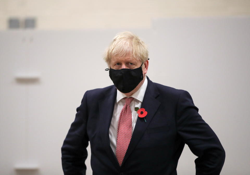 LEICESTER, ENGLAND - NOVEMBER 06: British Prime Minister Boris Johnson looks on at a testing centre in De Montfort University, amid the outbreak of the coronavirus disease (COVID-19) on November 6, 2020 in Leicester, United Kingdom. (Photo by Molly Darlington - WPA Pool/Getty Images)