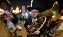 Austrian brass musicians perform a private serenade at the Oktoberfest in Munich, Germany.