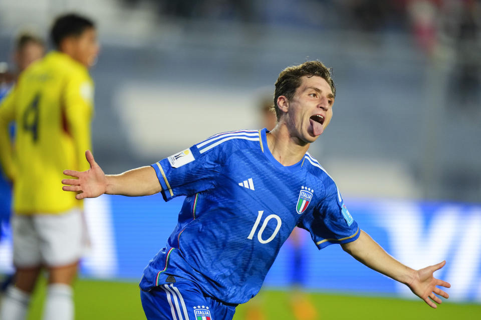 Italy's Tommaso Baldanzi celebrates after scoring his side's 2nd goal against Colombia during a FIFA U-20 World Cup quarterfinal soccer match at the Bicentenario stadium in San Juan, Argentina, Saturday, June 3, 2023. (AP Photo/Natacha Pisarenko)