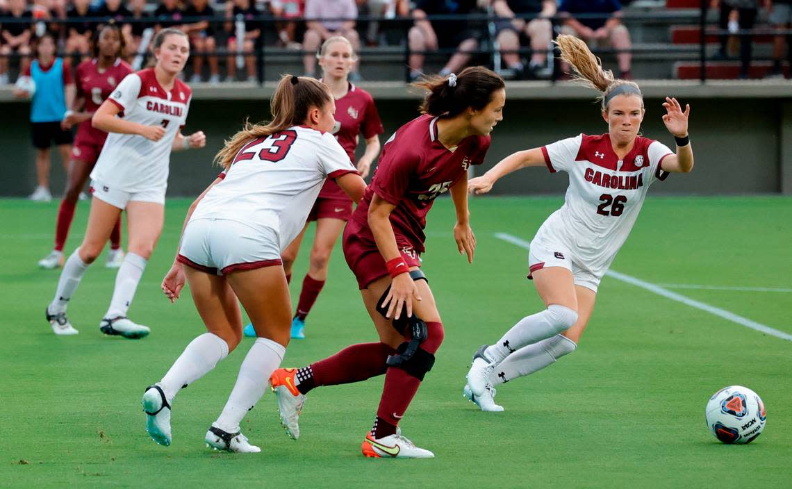 South Carolina’s Claire Griffiths (26) goes for the ball against a Florida defender at Eugene Stone Stadium on Aug. 18, 2022
