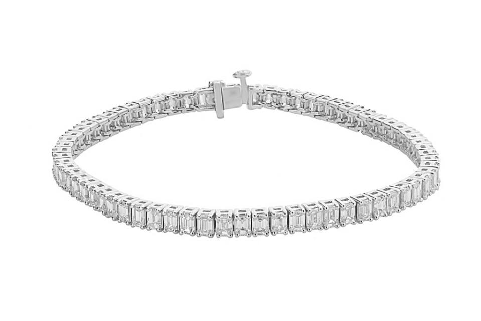 London Collection <a href="https://www.londonjewelers.com/london-collection-14k-white-gold-emerald-cut-diamond-tennis-bracelet" rel="nofollow noopener" target="_blank" data-ylk="slk:tennis bracelet in 14-k white gold with diamonds;elm:context_link;itc:0;sec:content-canvas" class="link ">tennis bracelet in 14-k white gold with diamonds</a>, $15,470 at London Jewelers