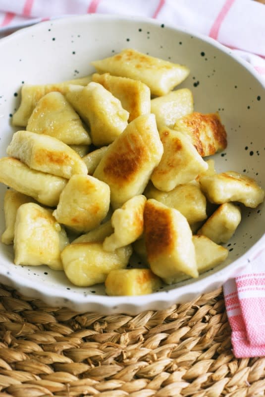 <p>Cooking with Ewa</p><p>Polish potato dumplings (kopytka), similar to Italian gnocchi, are made with mashed potatoes and flour. The difference is with the toppings! You can serve these simple, incredibly comforting dumplings with whatever you fancy!</p><p><strong>Get the recipe: <a href="https://www.cookingwithewa.eu/polish-potato-dumplings-kopytka/" rel="nofollow noopener" target="_blank" data-ylk="slk:Polish Potato Dumplings (Kopytka);elm:context_link;itc:0;sec:content-canvas" class="link rapid-noclick-resp"><em>Polish Potato Dumplings (Kopytka)</em></a></strong></p>
