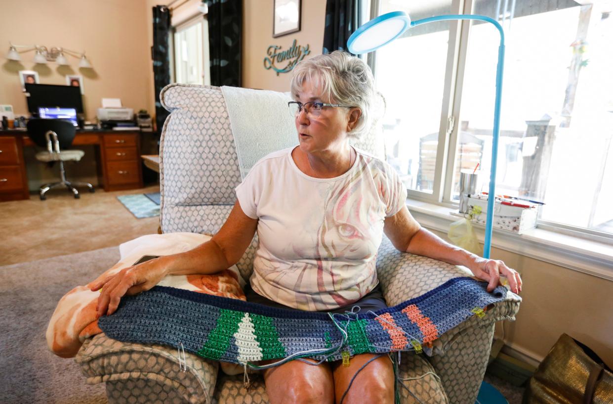 Dottie Lash talks about the process of crocheting blankets at her home on Thursday, June 13, 2024.