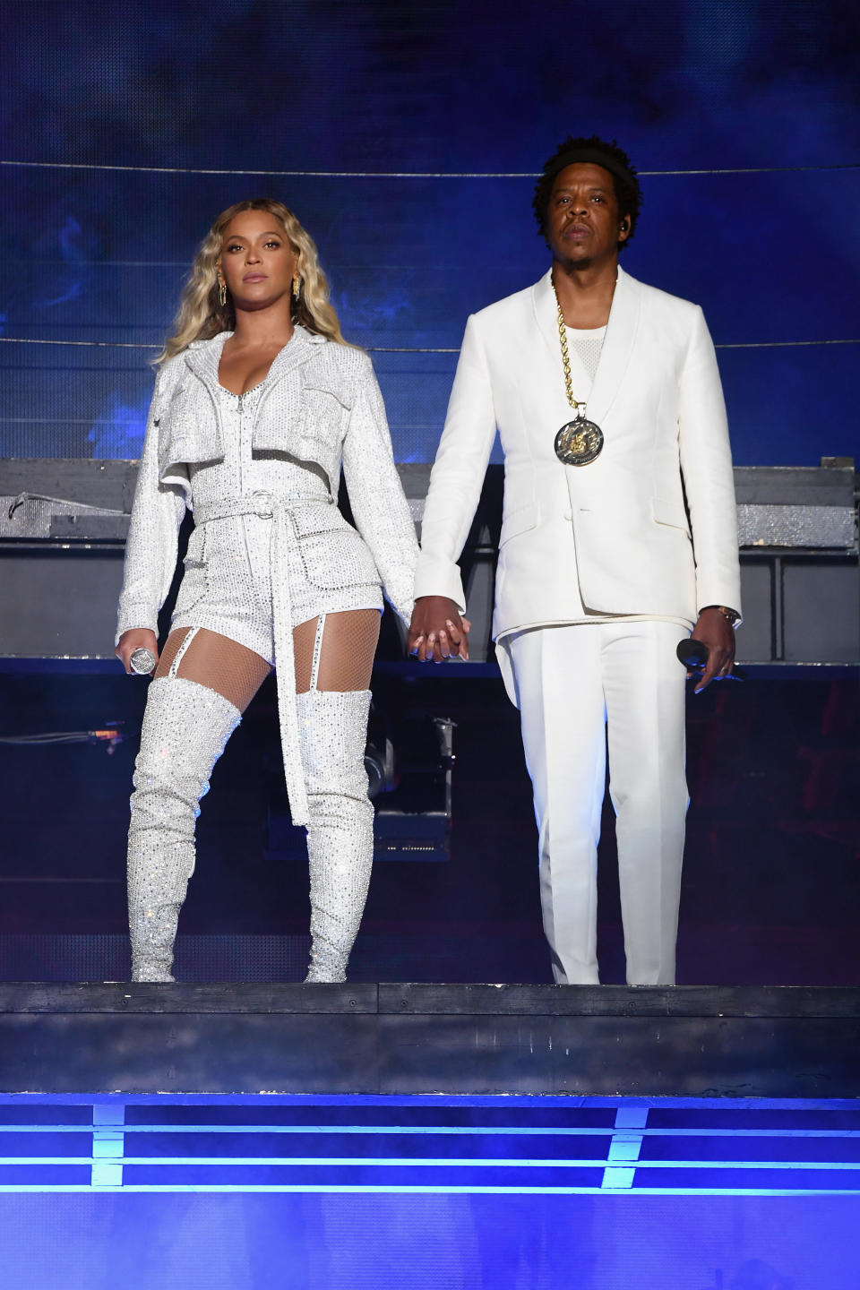 Beyonc&eacute; and Jay Z are one of the most stylish couples around. It makes sense, then, that when they decided to tour together, their show costumes were perfectly coordinated. In this photo, the two stand onstage during a performance in Cleveland in 2018.