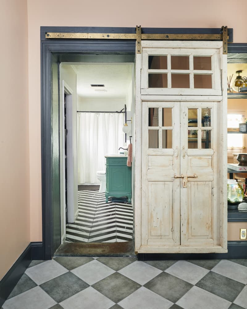 Door open to newly renovated bathroom.