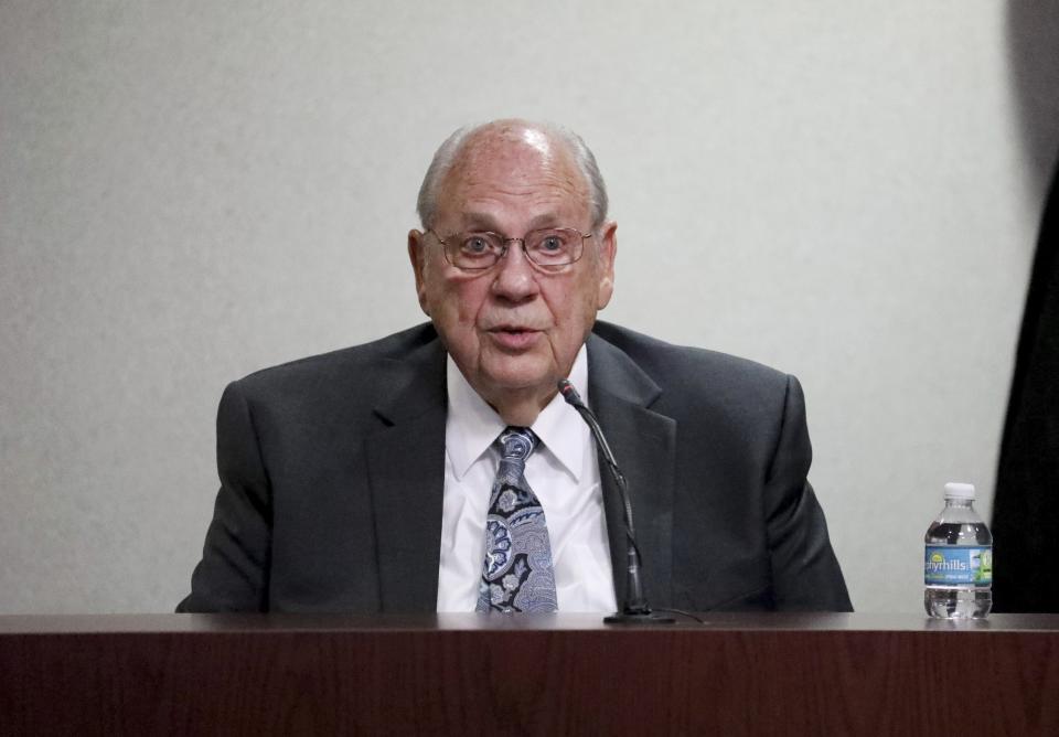 Former Tampa police captain Curtis Reeves gives testimony while being questioned by defense attorney Richard Escobar during his second-degree murder trial on Thursday, Feb 24, 2022, at the Robert D. Sumner Judicial Center in Dade City, Fla. Reeves is accused of shooting and killing Chad Oulson at a Wesley Chapel movie theater in January 2014. (Douglas R. Clifford/Tampa Bay Times via AP, Pool)