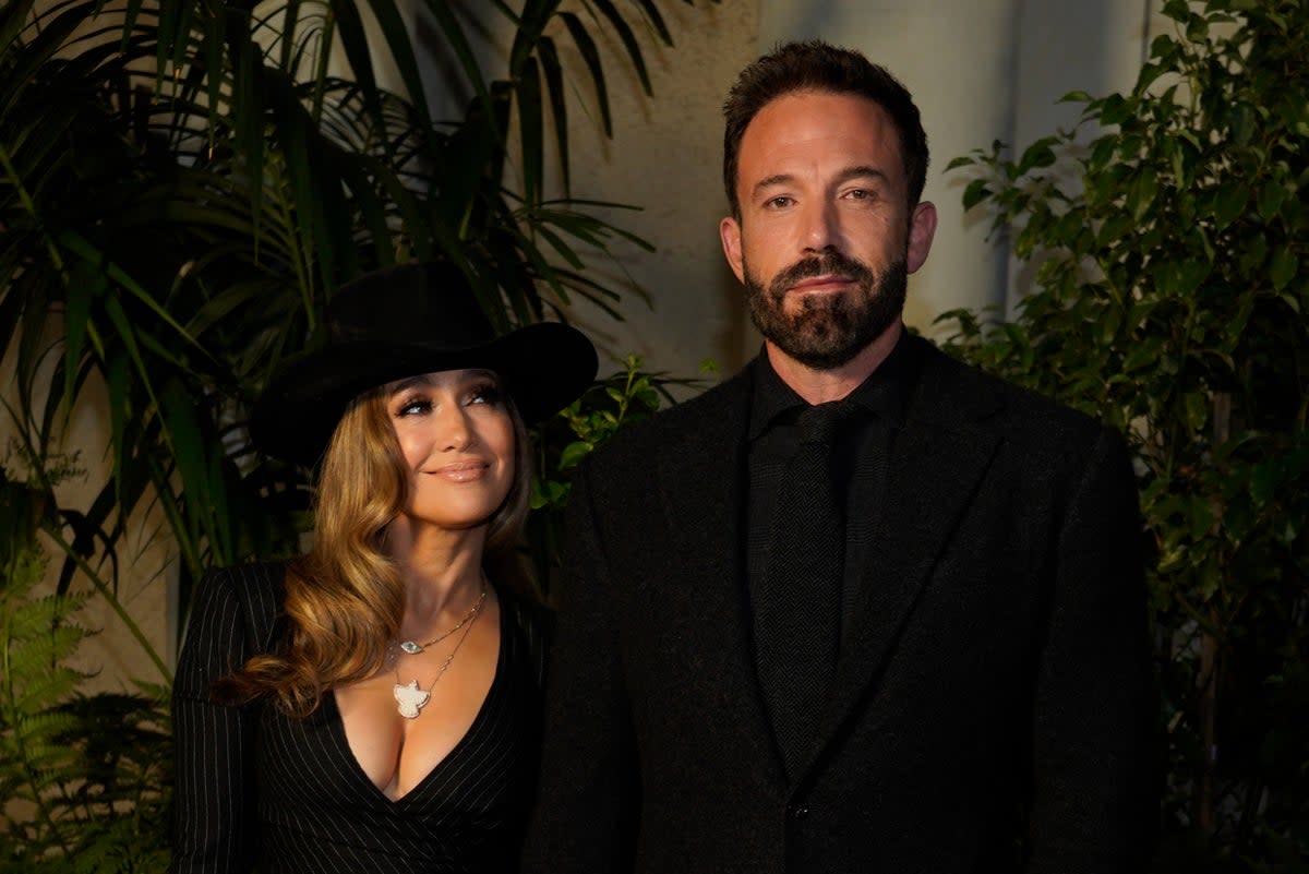 Jennifer Lopez, left, and Ben Affleck attend their first red-carpet event since tying the knot in July (Chris Pizzello/Invision/AP)