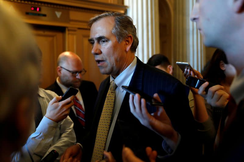 FILE PHOTO: Senator Jeff Merkley (D-OR) speaks to reporters following leaving the Senate floor after delivering a 15 hour speech against Judge Neil Gorsuch on Capitol Hill Washington