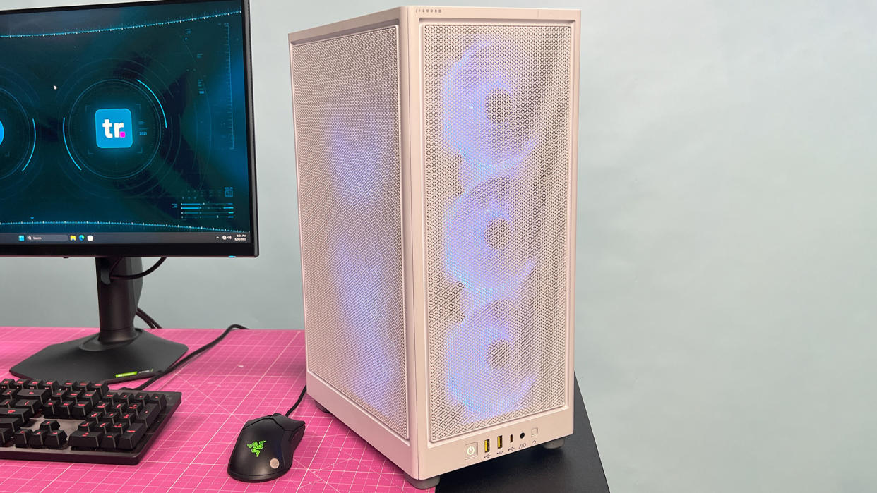  A Origin Chronos V3 gaming PC on a desk 