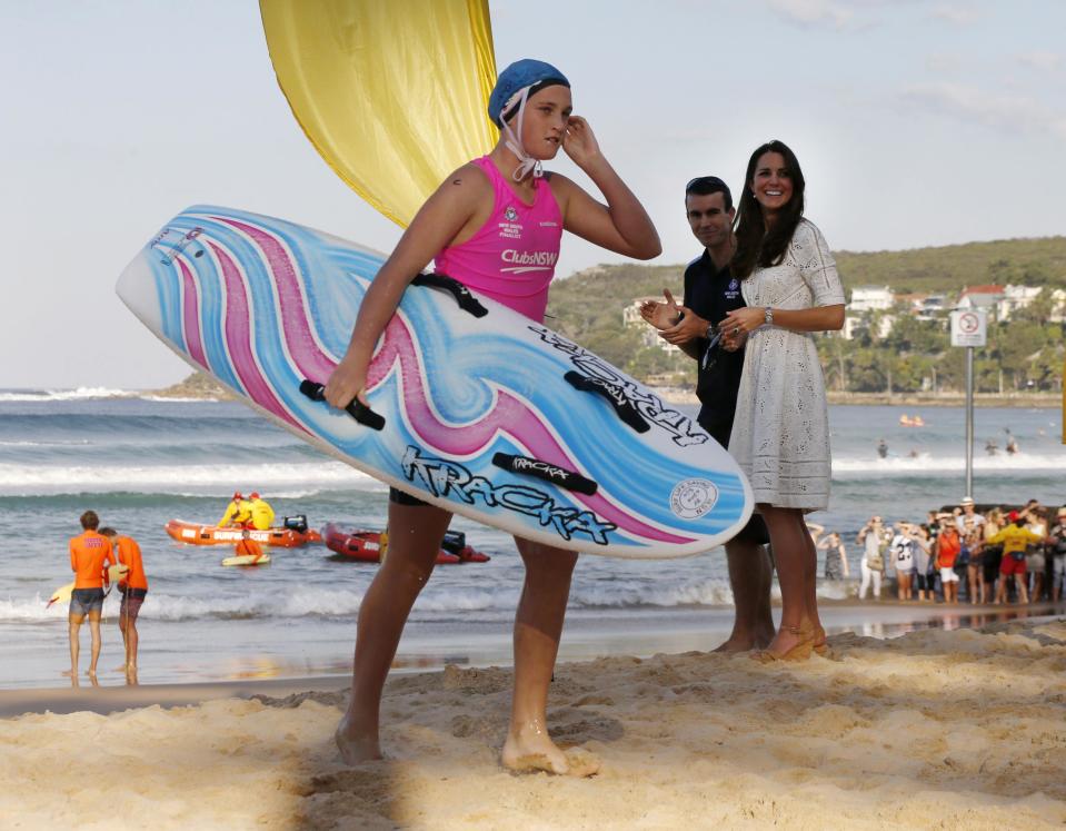 Catherine, the Duchess of Cambridge, talks to junior surf lifesavers during a visit to Sydney's Manly beach