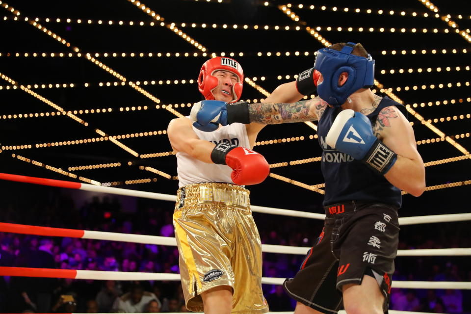 <p>Willie Lee (red) fights Kevin Wind (blue) in the 5th Precinct Grudge Match at the NYPD Boxing Championships at the Hulu Theater at Madison Square Garden on March 15, 2018. (Gordon Donovan/Yahoo News) </p>