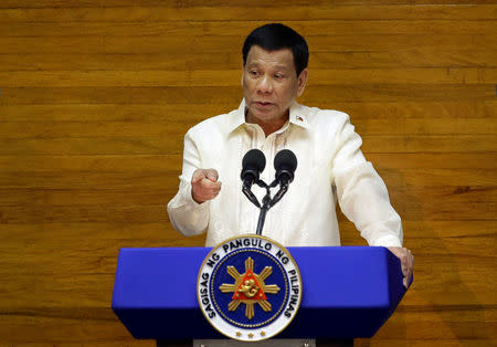 FILE PHOTO: Philippine President Rodrigo Duterte delivers his State of the Nation address at the House of Representatives in Quezon city, Metro Manila, Philippines July 23, 2018. /Czar Dancel