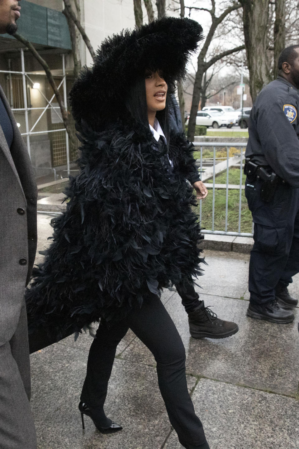 Rapper Cardi B leaves Queens Criminal Court after a hearing, Tuesday, Dec. 10, 2019 in New York. (AP Photo/Mark Lennihan)