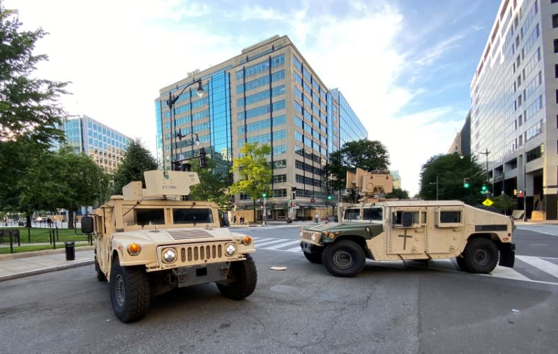U.S. military humvees block street near White House as the number of U.S. military forces deployed to the streets of the nation's capital increases in Washington