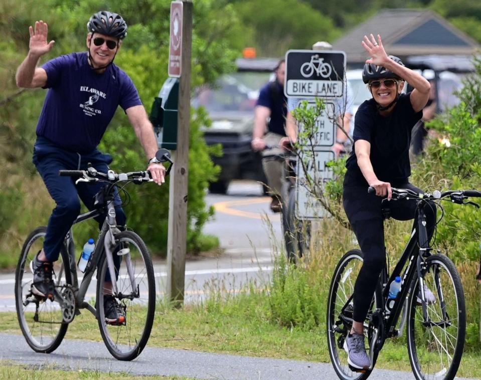 PHOTO: In this June 3, 2023, file photo, President Joe Biden and First Lady Jill Biden ride bicycles in Cape Henlopen State Park in Lewes, Delaware. (Jim Watson/AFP via Getty Images, FILE)