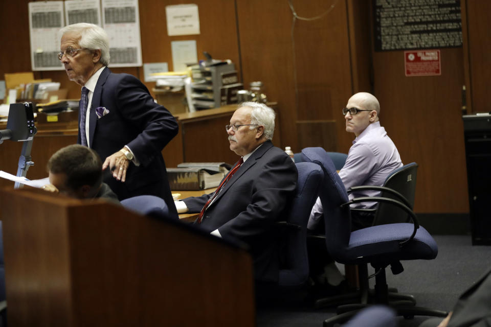 Michael Gargiulo, right, sits next to his attorneys Daniel Nardoni, left, and Dale Rubin, center, during closing arguments in the trial of People vs. Michael Gargiulo Wednesday, Aug. 7, 2019, in Los Angeles. Closing arguments continued Wednesday in the trial of the air conditioning repairman charged with killing two Southern California women and attempting to kill a third. (AP Photo/Marcio Jose Sanchez, Pool)