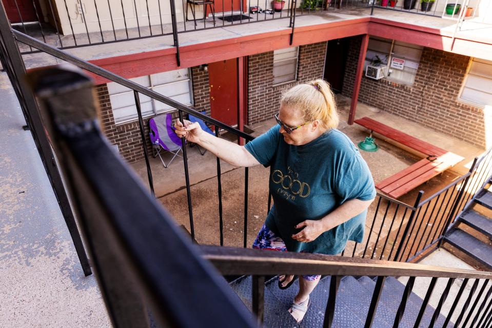 Krista Sullivan lives on the second floor of an Oklahoma City apartment complex. With her severe back pain, it's hard for her to make multiple trips up and down the stairs in a given day, but she jumped at the opportunity for an affordable apartment.