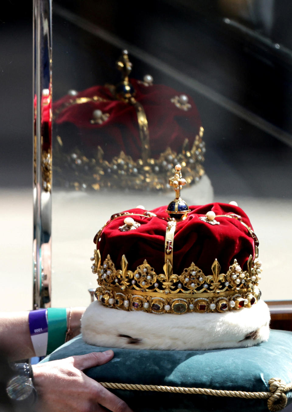 The Scottish Crown Jewels being carried to an awaiting car ahead of a national service of thanksgiving and dedication to the coronation of King Charles III and Queen Camilla at St Giles' Cathedral on July 5.<span class="copyright">Chris Jackson—Pool/Reuters</span>