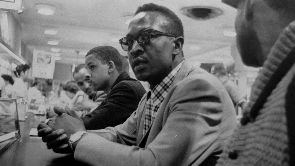 Black students wait in vain for food service at this F.W. Woolworth store in Greensboro, North Carolina, on April 20, 1960. - Greensboro News & Record/AP