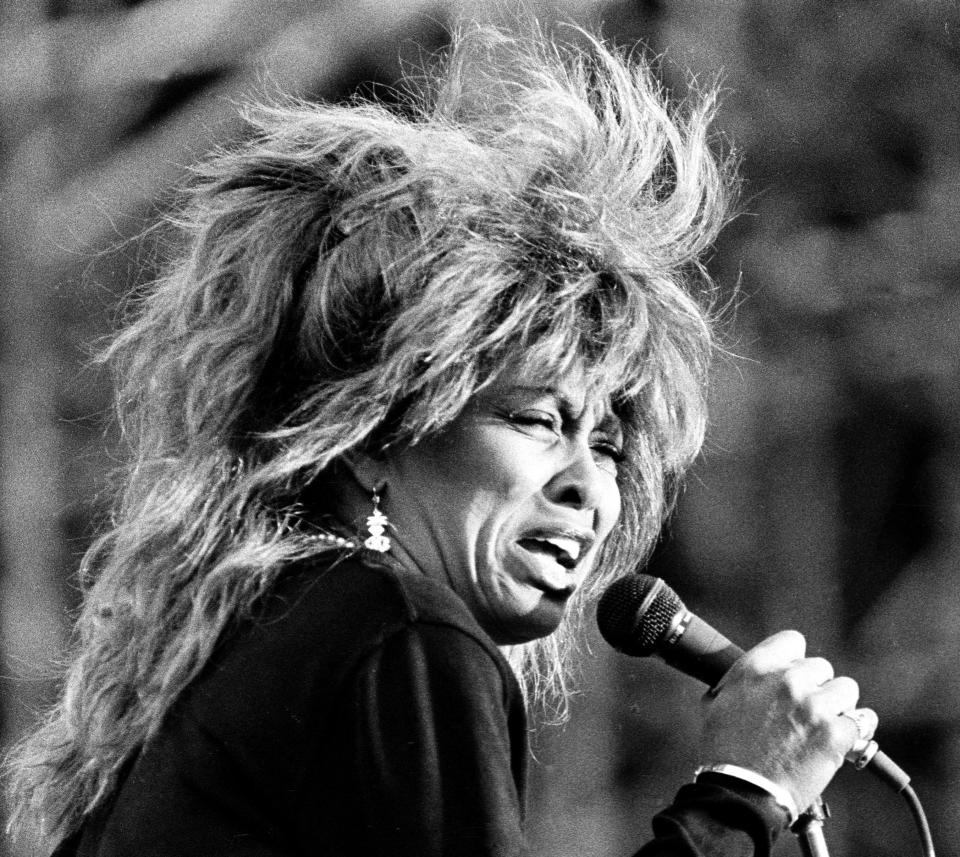 Tina Turner performs during her world tour 87 at the summer open air concert in Hamburg, Germany July 3, 1987. (Reuters)