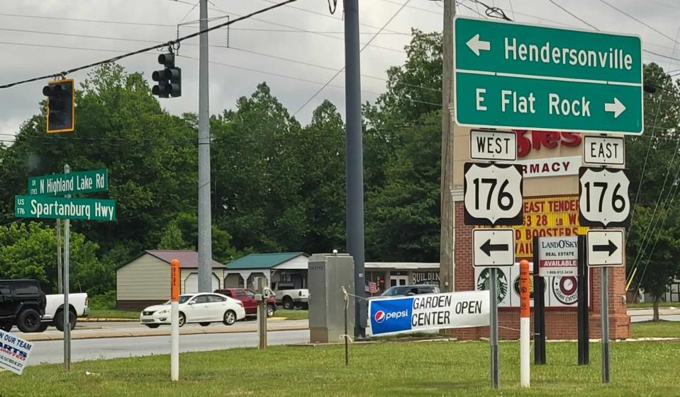 Signs for Hendersonville and East Flat Rock at the intersection of Upward Road and Spartanburg Highway in Flat Rock.