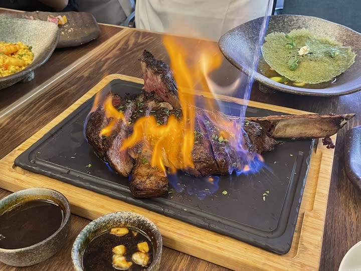 The famed Bourbon Whiskey Aged Tomahawk Steak at Opus Grill & Bar (Photo: voco hotel)