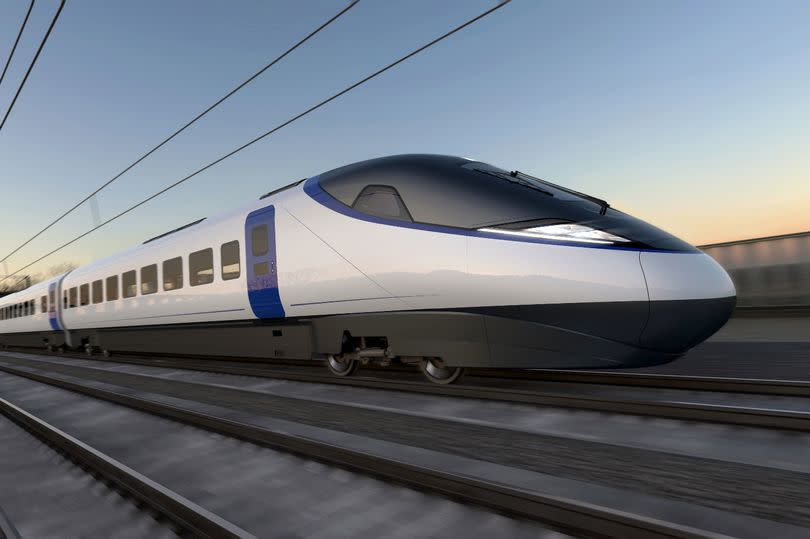 Artist visualisation of a HS2 train on the railway.