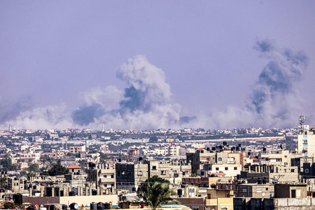 A wide image overlooking the Khan Yunis skyline as smoke rises amid the Israeli offensive in Gaza (Said Khatib / AFP via Getty Images)