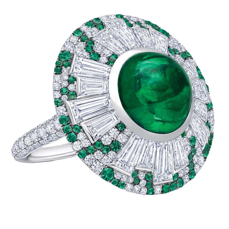 A cabochon emerald totaling 6.75 carats is surrounded by emeralds and diamonds set in platinum on Martin Katz’s Parasol ring; price upon request, at the appointment-only Martin Katz The Penthouse, Beverly Hills