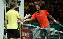 Tennis - ATP 500 - Rotterdam Open - Rotterdam Ahoy, Rotterdam, Netherlands - February 17, 2019 France's Gael Monfils shakes hands with Switzerland's Stan Wawrinka after winning their Final match REUTERS/Yves Herman