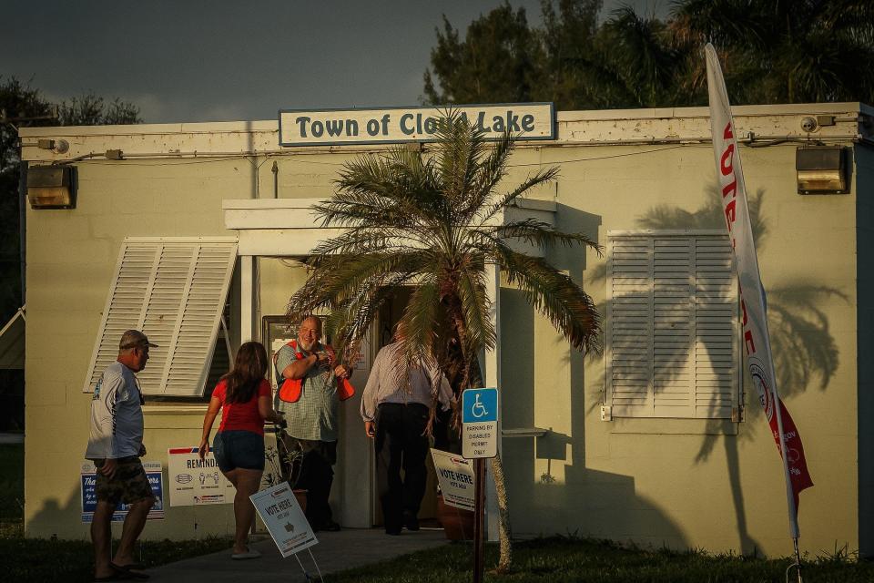 People wait in line to vote on election day 2022 in Cloud Lake.