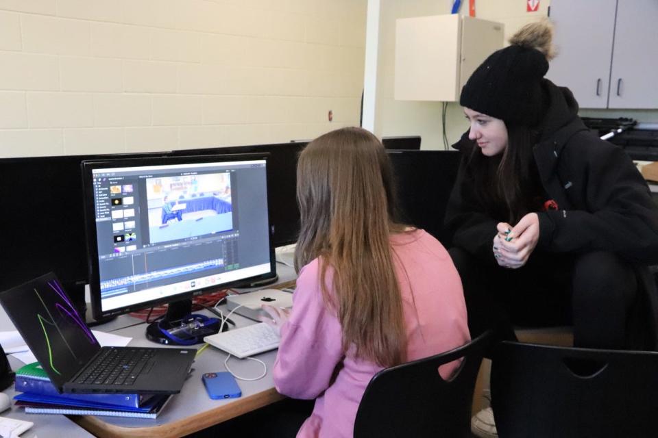 Inland Lakes students work on editing a video for ILS news.