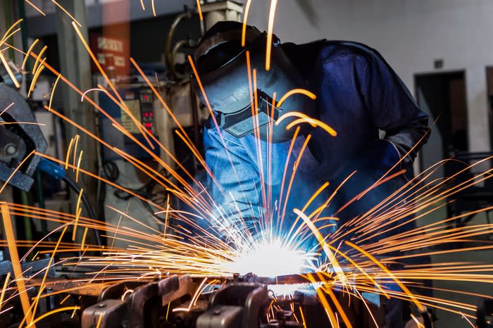 A man welding.