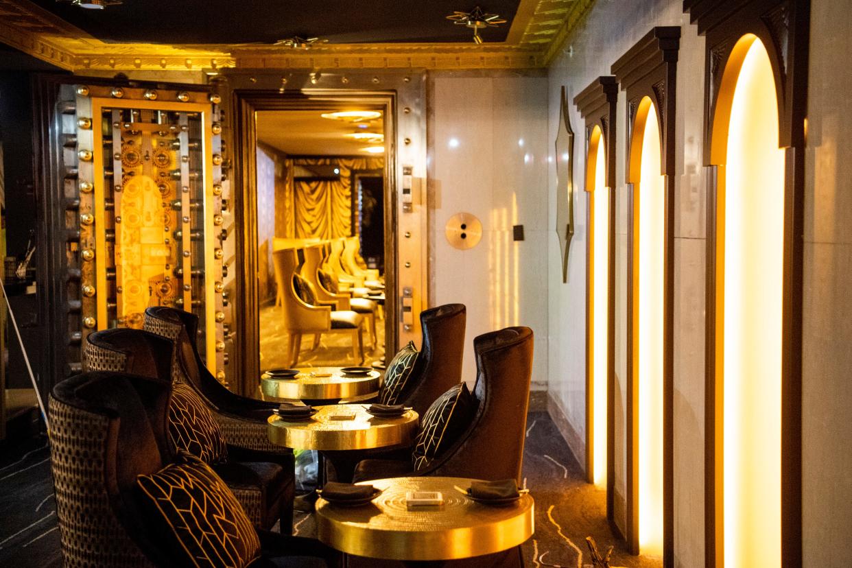 From The Vault: "Get below the surface to a swanky cocktail lounge reminiscent of old Hollywood - in the Vault of the former Holston Bank"