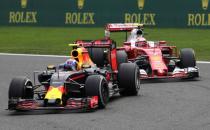 Belgium Formula One - F1 - Belgian Grand Prix 2016 - Francorchamps, Belgium - 28/8/16 - Red Bull's Max Verstappen of the Netherlands and Ferrari's Kimi Raikkonen of Finland drive during the Belgian F1 Grand Prix. REUTERS/Yves Herman