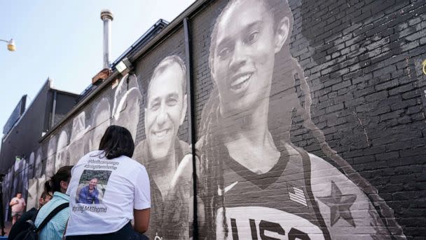 PHOTO: People visit a mural of Brittney Griner and other hostages around the world created by the Bring Our Families Home Campaign, a campaign for Americans wrongfully detained or held hostage abroad, in Washington, D.C., July 20, 2022. (Sarah Silbiger/Reuters)