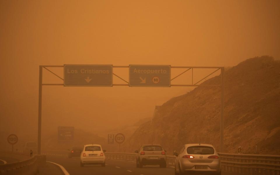 The storm turned the sky above Tenerife orange - DESIREE MARTIN/AFP/GETTY IMAGES