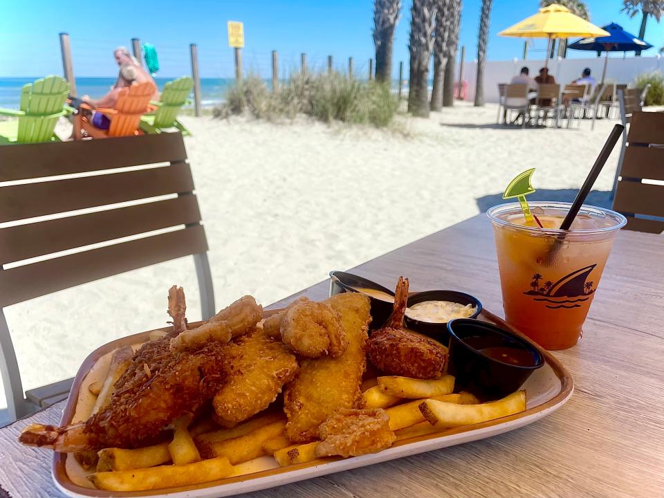 Seafood combo platter and 5 O'clock Somewhere from Landshark Bar & Grill in Daytona Beach.