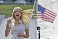 Ivanka Trump, daughter and adviser to President Donald Trump, removes her protective mask as she takes the stage before a campaign event Tuesday, Oct. 27, 2020, in Sarasota, Fla. (AP Photo/Chris O'Meara)