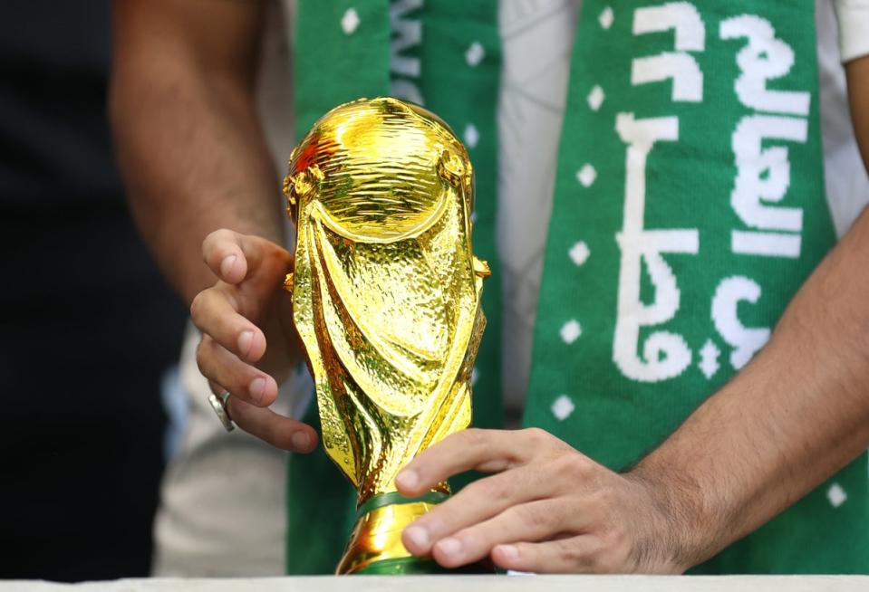 A Saudi Arabia fan with a replica World Cup Trophy during the Fifa World Cup Qatar 2022 (Getty Images)