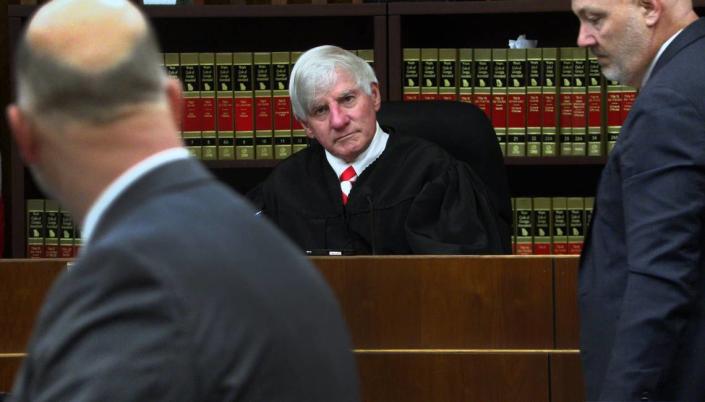 Superior Court Judge Bobby Peters, center, presides over the trial of Torrance Terrell Menefee, not pictured, Tuesday afternoon in superior court in Columbus, Georgia.