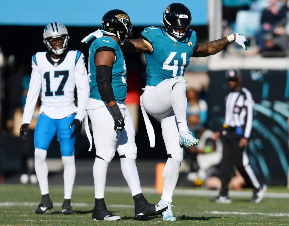 Jacksonville Jaguars linebacker Josh Allen (41) celebrates his fourth quarter sack, adding to his team season sack record that he reached in Sunday's game. The Jacksonville Jaguars hosted the Carolina Panthers at EverBank Stadium in Jacksonville, FL Sunday, December 31, 2023. The Jaguars went in at the half with a 9 to 0 lead and came away with a 26 to 0 victory over the Panthers. [Bob Self/Florida Times-Union]