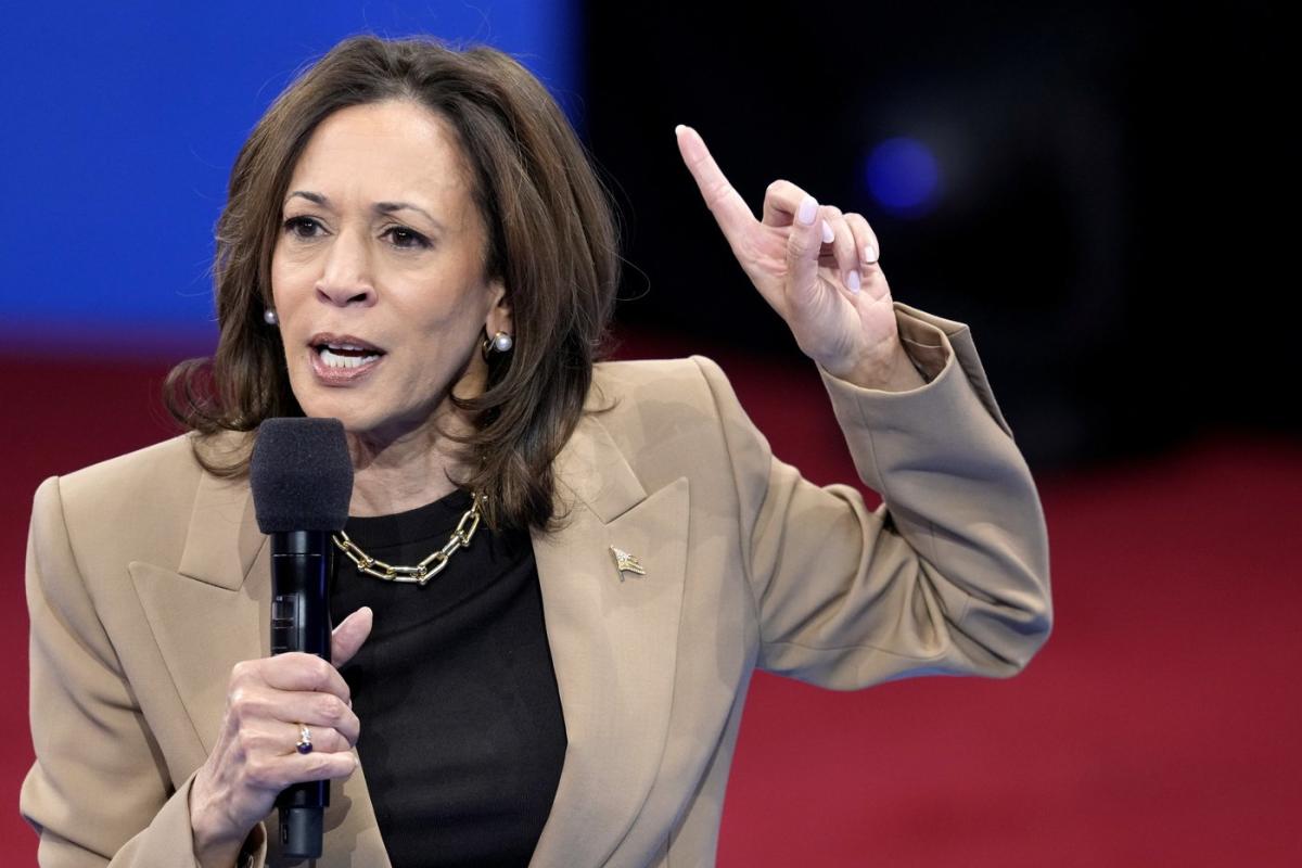 The Latest: Harris says it’s not time to ‘play politics’ over hurricane recovery