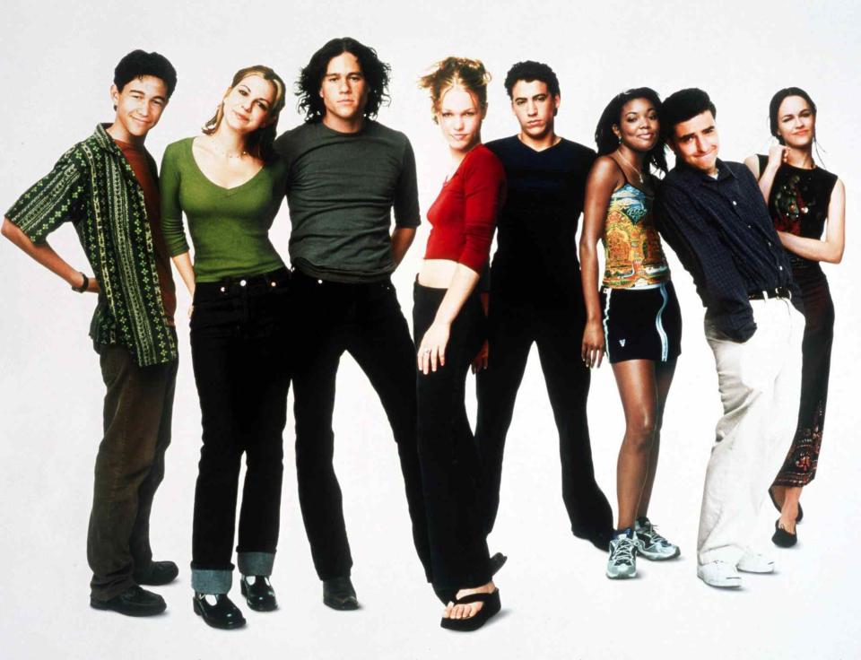 Moviestore/REX/Shutterstock From L: Joseph Gordon-Levitt, Larisa Oleynik, Heath Ledger, Julia Stiles, Andrew Keegan, Gabrielle Union, David Krumholtz and Susan May Pratt in <em>10 Things I Hate About You</em> (1999)