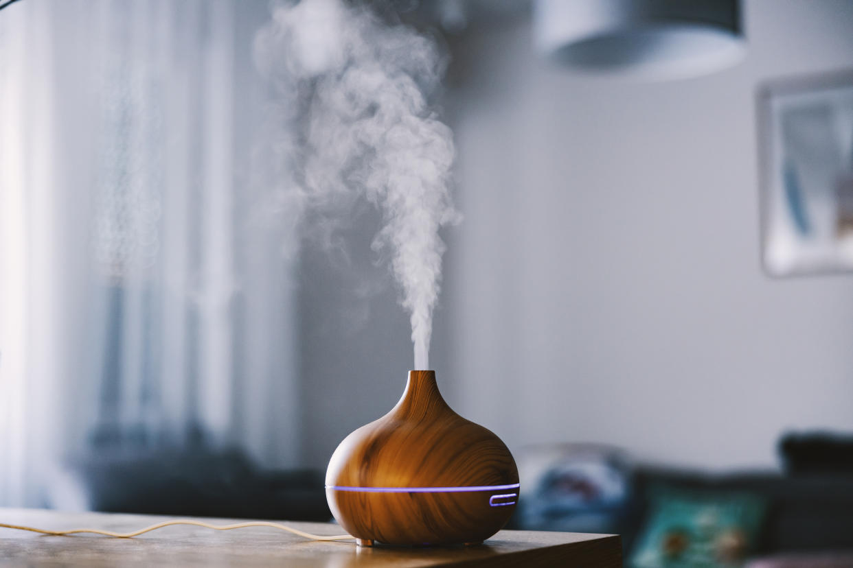 Humidifier with steam moisturizing air at home.